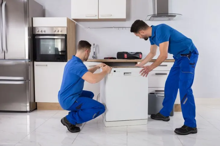 movers installing kitchen